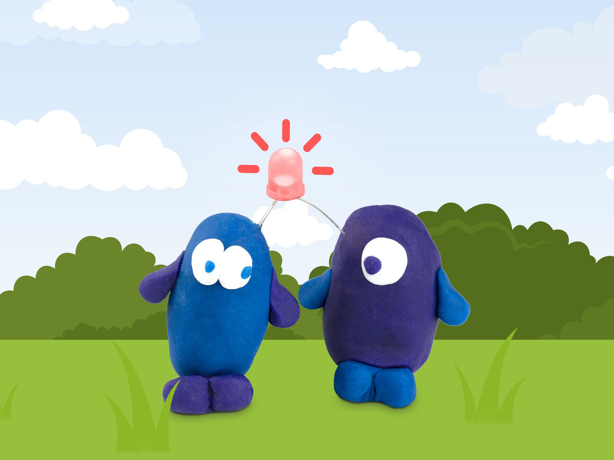 Blue and purple dough buddies with a glowing LED between them