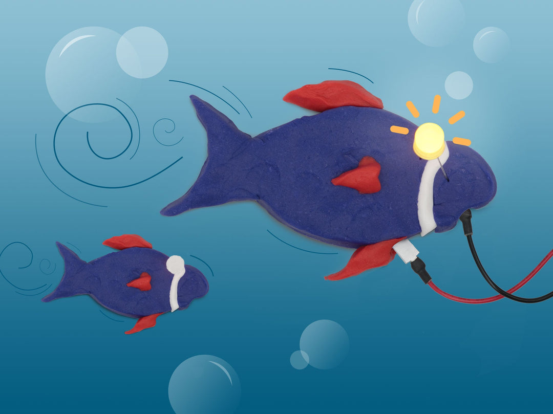Purple dough fish with red fins and a glowing LED eye swimming underwater