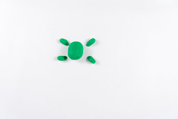 Green dough turtle body with four legs