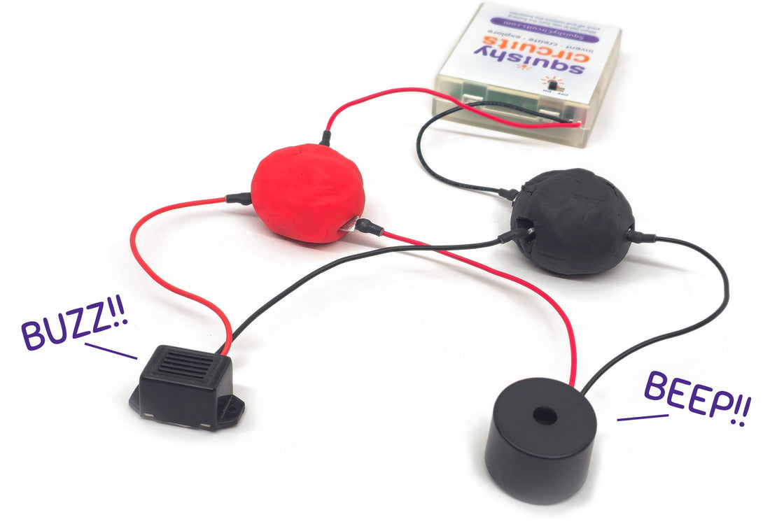 A mechanical buzzer and a piezo buzzer wired into play dough circuits, labeled BUZZ and BEEP