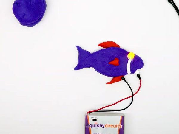 Purple dough fish with a glowing LED eye