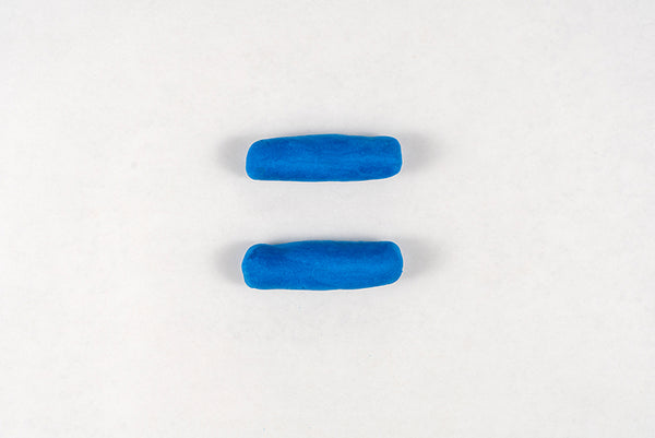 Two rolled pieces of blue dough