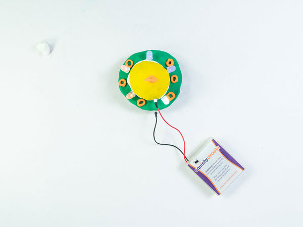 UFO with LEDs, wired to the battery holder