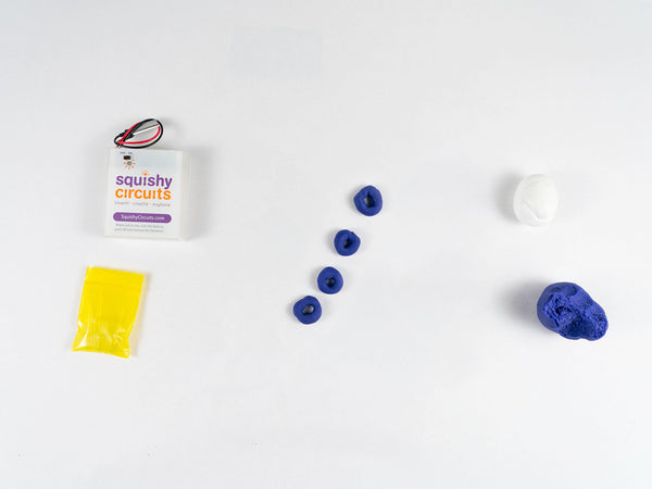 Four small purple dough pieces