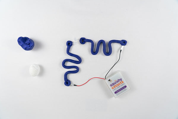 Two squiggles joined by an LED at one end