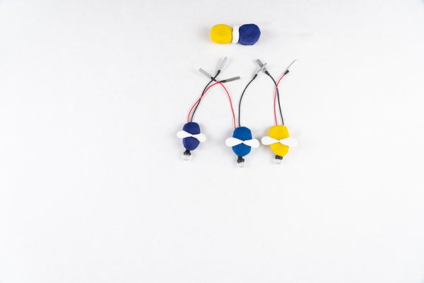 Yellow and purple dough module above the three fireflies on wired LEDs