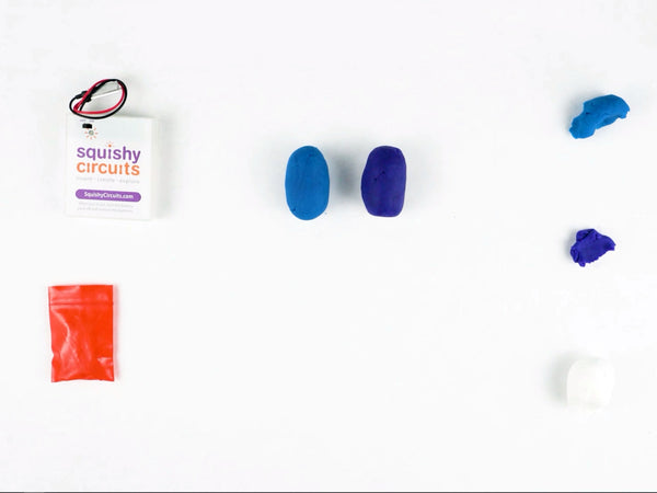 Two oval dough bodies, one blue and one purple